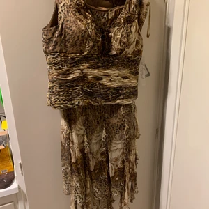 Klänning  - Helt ny aldrig använda 