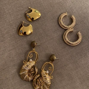Guldringar - Säljer tre par örhängen 40kr styck - buda!