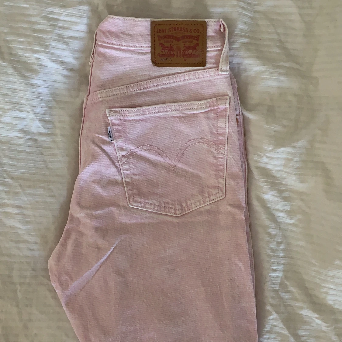 Rosa Levis jeans 501s