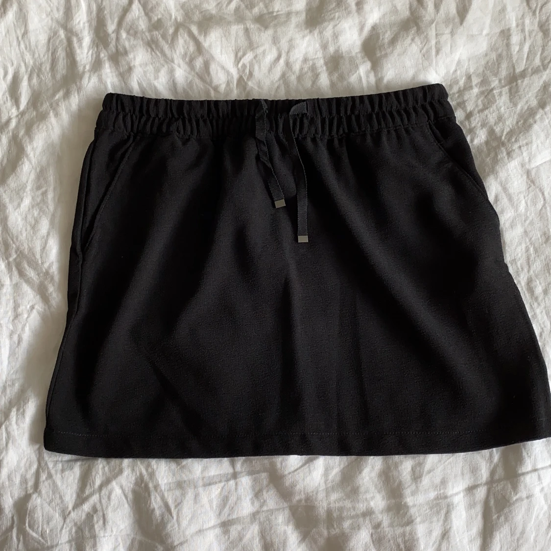 Vardagskjol med fickor