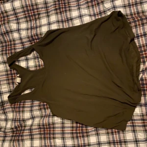 Grönt linne - Ett skönt grön linne för sommar dagar