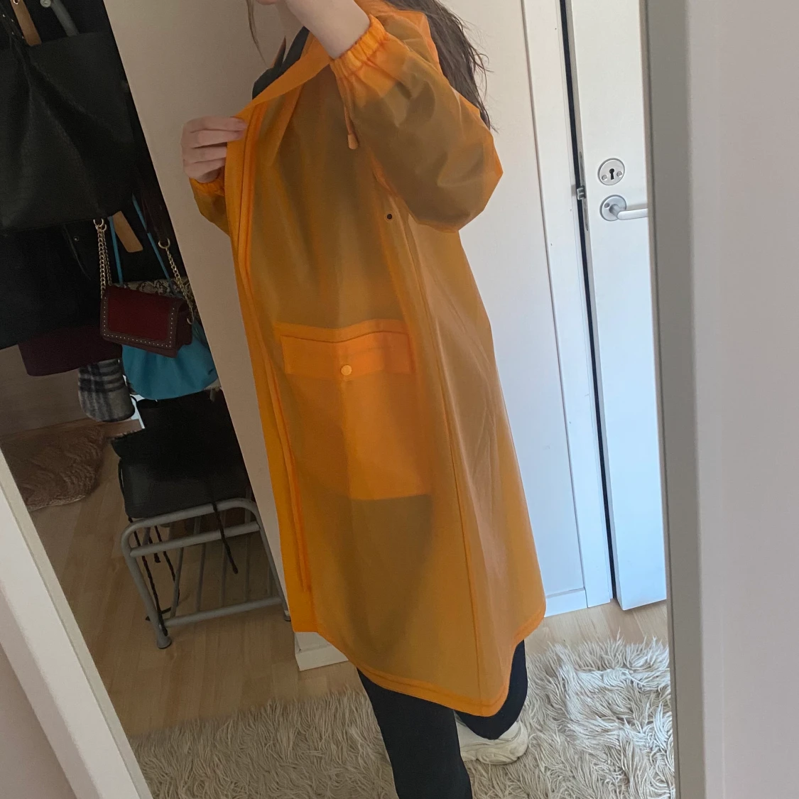 Genomskinlig regnkappa - 90