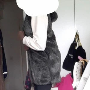 Pälsen väst - En pälsen väst som man kan ha på sig i vintern och hösten den är inte andvänd