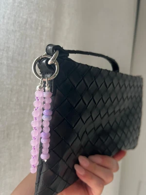 Bagcharm  - Snygg Bagcharm som puffar upp din väska. 