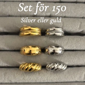 Set med breda ringar i guld och silver - Man väljer silver eller guld 