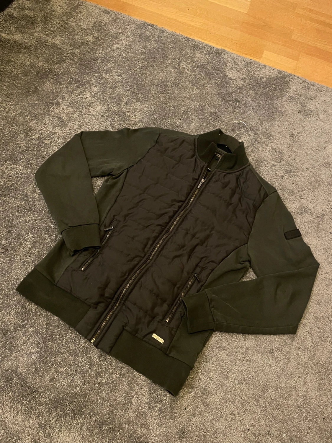 Mörkgrön cardigan ifrån cavallaro 