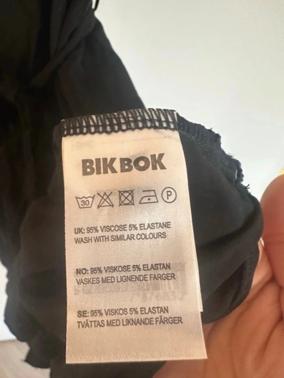 Svart ärmlös skjortklänning med knappar - 5