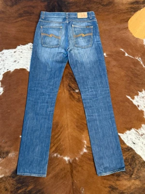 Nudie GrimTim LightRichBlue - Tjena! Säljer dessa riktigt snygga nudie i modellen GrimTim, W31/L34, hör av dig vid funderingar!🙌