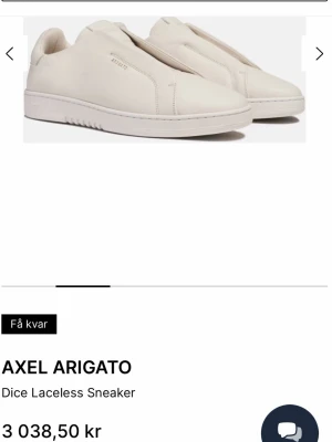 Axel Arigato Dice Laceless Sneaker - Stilrena vita sneakers från Axel Arigato i modellen Dice Laceless. Denna modell produceras inte längre. Använda endast ett fåtal gånger, skriv privat för fler bilder. 