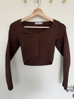 Brun top - Stradivarius brun top, i storlek XS, använd några gånger :) 🌼