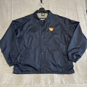 Vintage Cooperstown New York Lined Coaches Jacket XL - Vintage coach jacket from Cooperstown New York ⚾️ embroidered logo front. Lined so not thin, works spring/autumn. Clean oversized fit with snap buttons + elastic cuffs. Easy everyday piece  NO Size tag, See Measurements: p2p 71 cm, length 76 cm, sleeve (center collar) 97 cm  Good vintage condition, normal wear