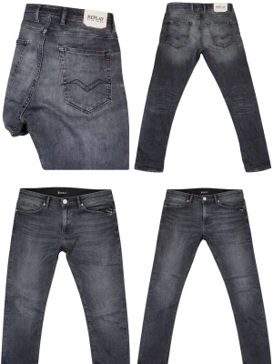 Replay grå slim fit jeans herr - Snygga grå jeans från Replay i slim fit-modell med klassisk femficksdesign och svarta detaljer. Jeansen har en diskret tvättad look och är tillverkade i mjukt denimtyg med stretch för extra komfort. Perfekta för en avslappnad och trendig stil.