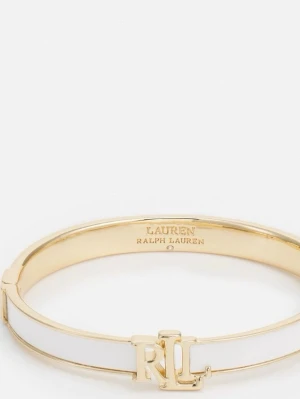 Ralph Lauren armband - Säljer denna snygga Ralph Lauren armband i färg guld-coulured/white, riktig fin armband för kvinnor, armbandet är knappt använd, fick den i födelsedagspresent. Ny pris på denna är 929kr på zalando. Pris kan diskuteras!!  Omkrets: 17 cm i storlek One Size Armbandsbredd: 0.7 cm i storlek One Size
