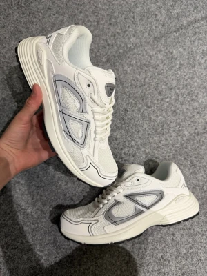 CD white sneakers 42 - Size 42, true to size. Very comfortable and soft. Brand new, never worn outside. 