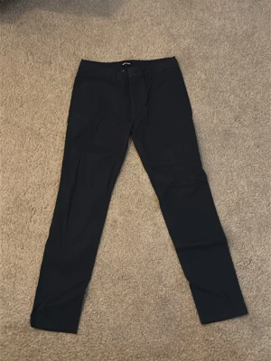 Byxor  - Ett par chinos/kostym byxor 