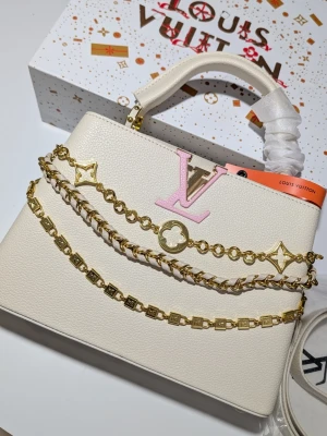 Iouis Vuitton handväska  - Om jag ska vara ärlig så har jag inte sett en finare väska än den här.