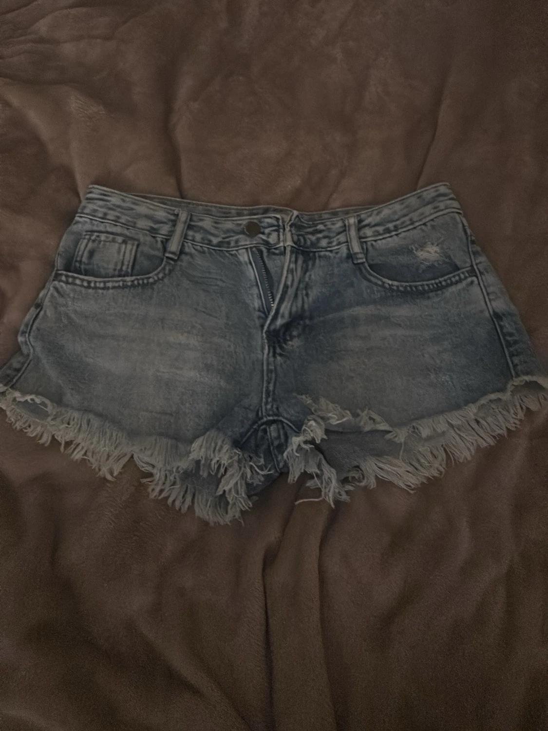 Blå jeansshorts med fransig kant - 1