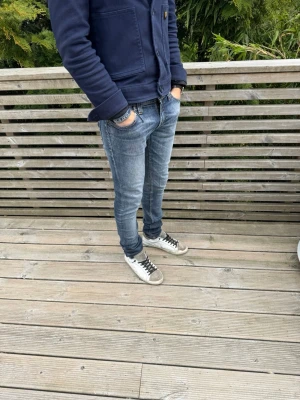 Nudie jeans - Nudie jeans - Modell: tight long john - Storlek:  W27/L34- skick: 9/10 - Nypris runt 2000kr