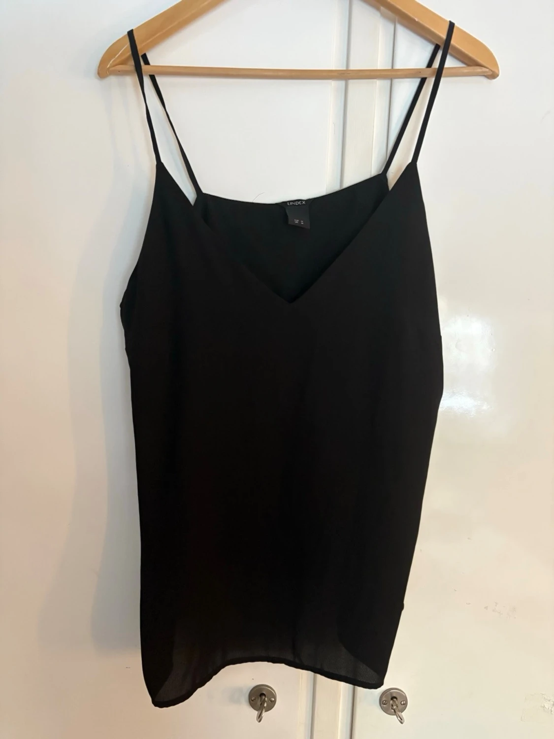 Svart linnetopp från Lindex