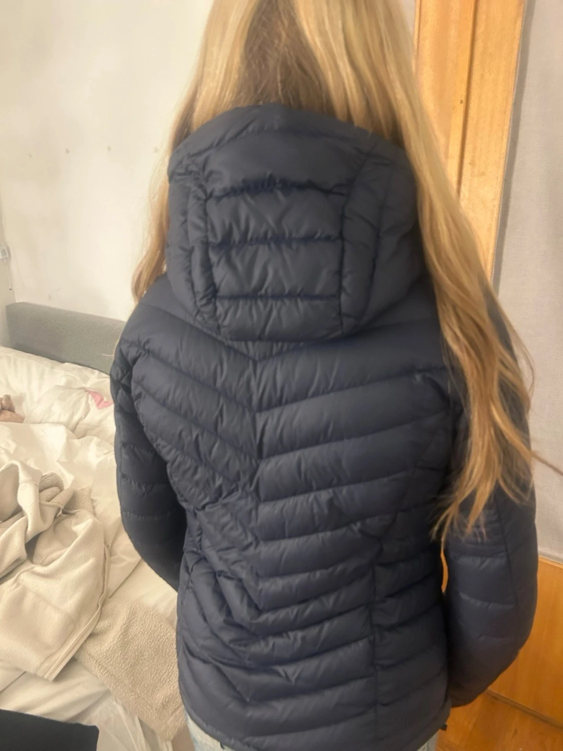 Svart/ mörkblå  dunjacka från Peak Performance - 1