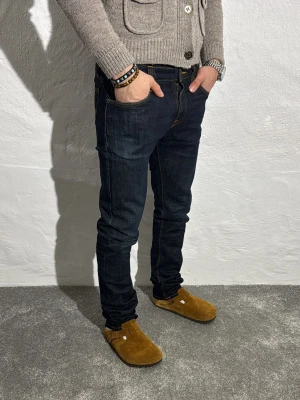 Nudie  jeans  - Ett par riktigt snygga jeans från nudie i storlek W29 L32 i modellen Tube Tom 