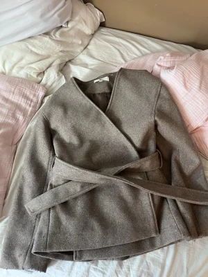 Kappa - Beige kappa från gina