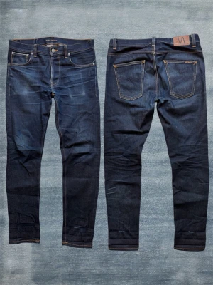 *SELVAGE* NUDIE LEAN DEAN - Ett par sjukt trevliga nudie jeans gjorda i selvedge av högsta kvalitet! Modellen kallas ”Lean Dean” och sitter slim. Storlek 32/32, hör av dig vid frågor! Mått: Midja - 43.5cm, Ytterbenslängd - 108cm, Benslut - 17cm 