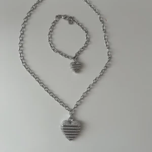 Swarovski necklace and bracelet  - Necklace and bracelet from Swarovski. Not used. But the bracelet has a small defect. Can be sold separately.