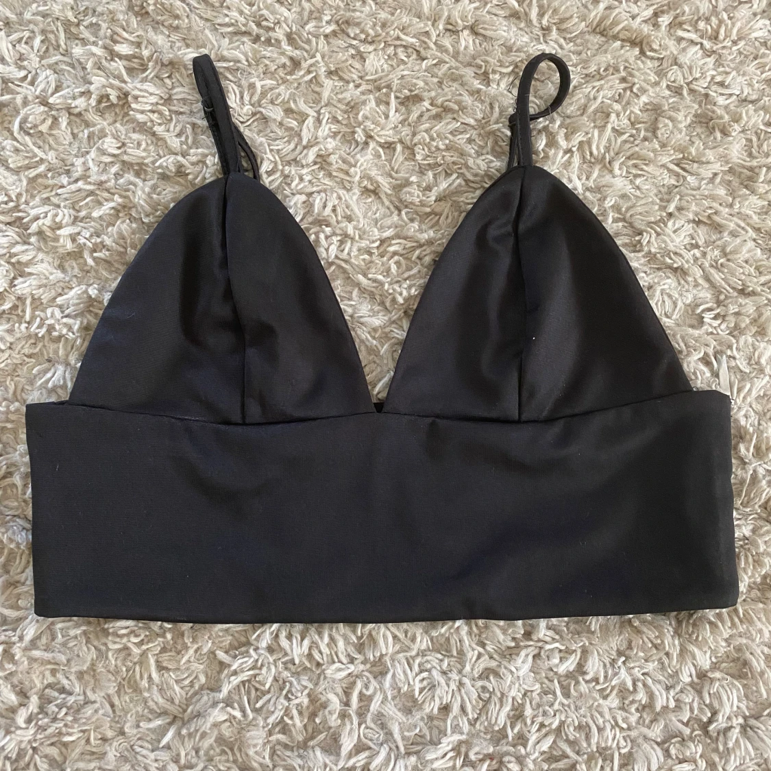 Svart bikiniöverdel