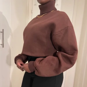 Cozy top -  Really comfortable that u can wear under a coat 