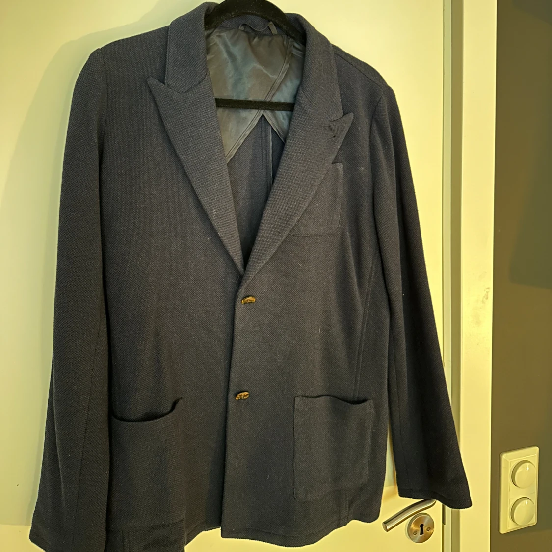 Blå stickad kavaj - 90