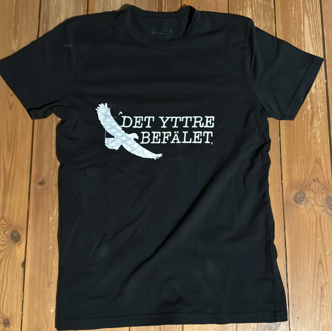 10. Svart Det Yttre Befälet T-shirt M
