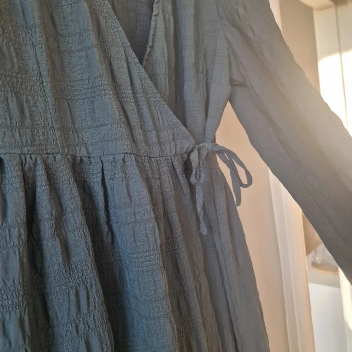 Bäckebölja omlottklänning  - 91