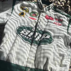 Real Racer Jacket from AMP ENERGY.   Worth - 335 USD  ( Around 3500 kr)   Size - L ( but fits like a medium/Large)   Used around 10 times.  Has a baggy but little cropped fit.   Selling for 1900kr because of the high value of the product. 