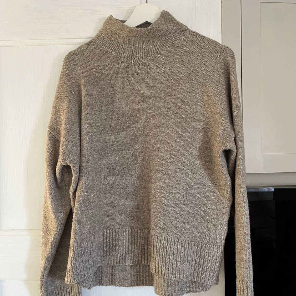 Stickad glittrig tröja 