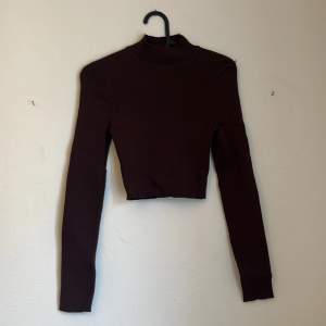 Tight fitted dark brown turtleneck work once 