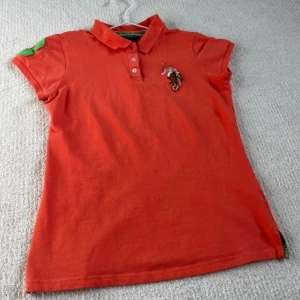 Polo T shirt - A beautiful T-shirt in coral colour  Used but in immaculate condition   