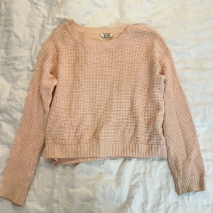 Rosa stickad tröja - En söt rosa stickad tröja 