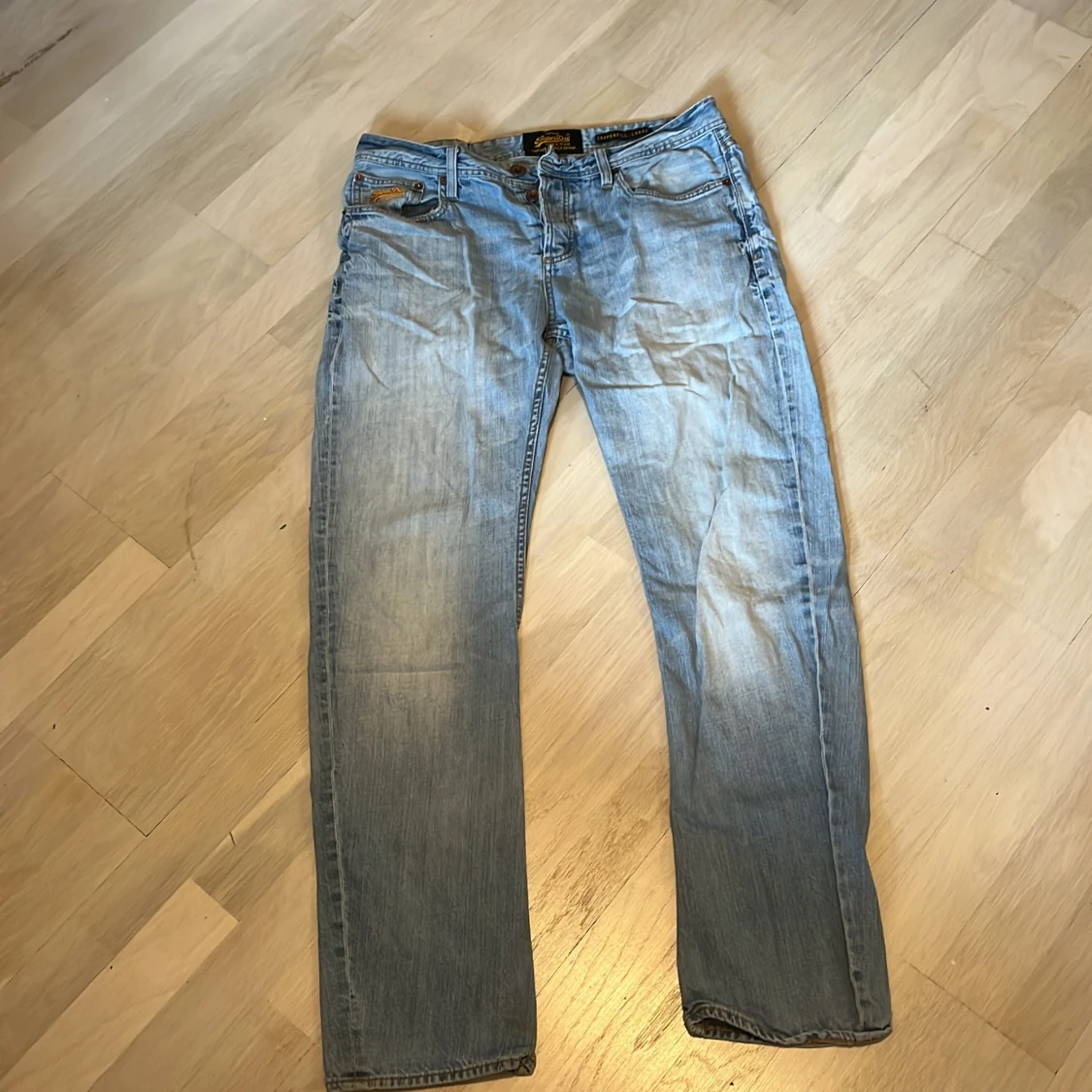 Ljus blåa vintage SuperDry jeans - 90