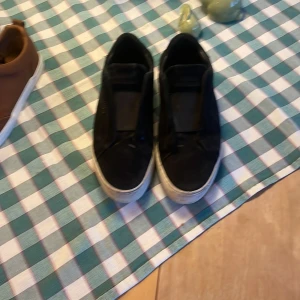 Arigatos svarta - Säljer mina arigatos svarta här