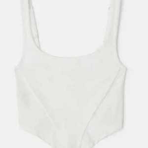 Culotte Club korsett linne - Culotte Club mjukt korsett linne i vit, storlek L.  Bra skick, använd spartsamt.  Köpt för 800kr.