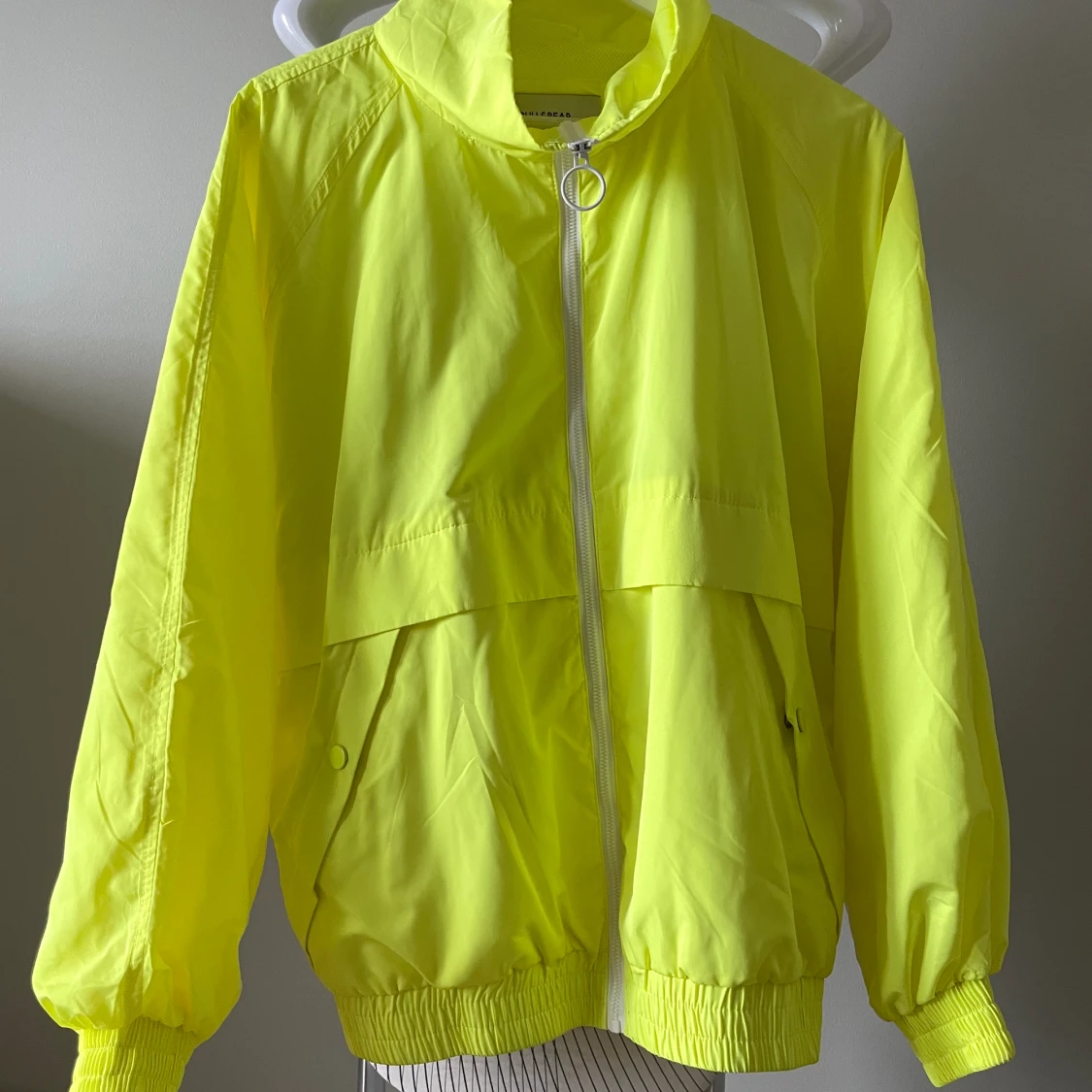 Neon yellow jacker with raglan sleeves
