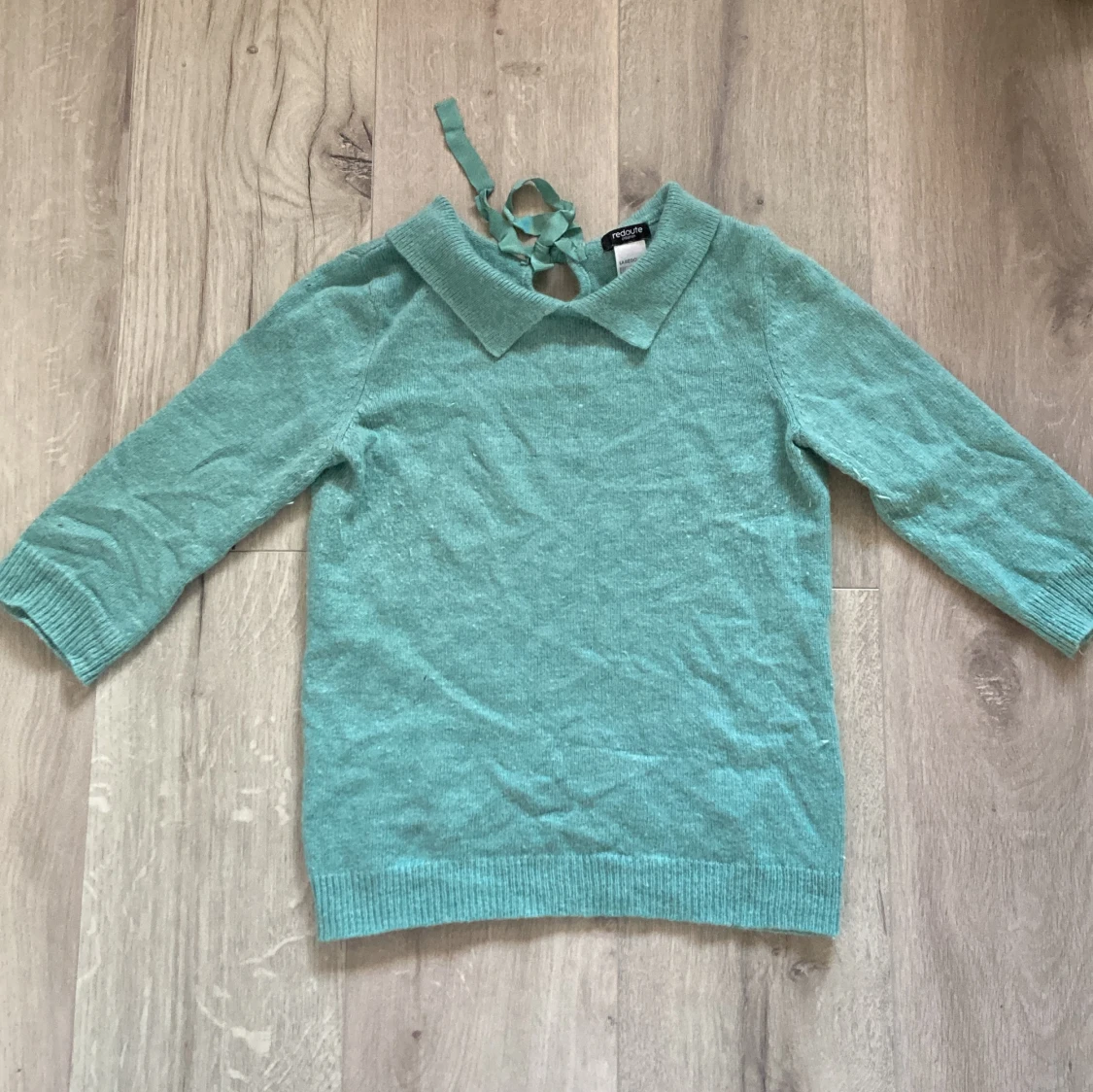 Tröja med knytbar rosett 