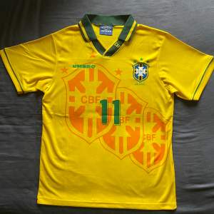 Brasilien fotbolltröja VM 1994 med Icon Romario på rygg 
