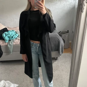 Svart kappa  - Tunn kappa från BikBok 