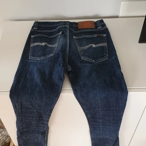 Nudie jeans high kai - Relativt väl använda men hela och rena. W27