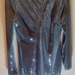 Glittery sparkly silver dress - Medium sized and great for the holidays while also very capturing