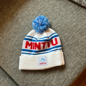 Minttu mössa  - Helt ny minttu mössa som är oanvänd!