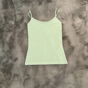 Fin Topp - Helt oanvänd i stl XS, köpt från Newyorker. Superfint skick