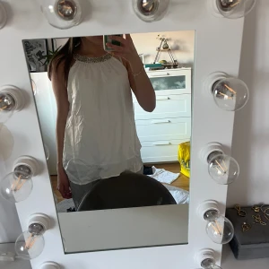 Topp - Snygg halterneck topp, lappen med storleken på är borta men skulle gissa på M
